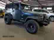 1999 Jeep Wrangler Sport z VIN 1J4FY19S0XP487645, wystawiony jako Copart lot #84068725 z przebiegiem 197 001 mil mil oraz Czysty tytuł • Clean title. Historia ofert i sprzedaży dostępna na DreamBid. Obrazek 4.
