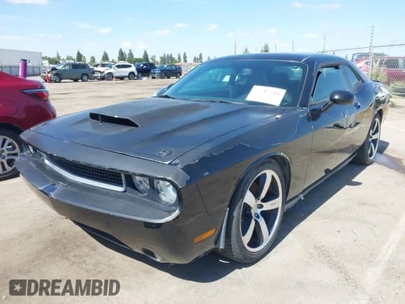 2012 Dodge Challenger SRT-8 392 с VIN 2C3CDYCJ5CH208805, выставлен на аукционе IAAI как лот 43187211 с пробегом 120 224 миль миль и . История ставок и продаж доступна на DreamBid. Изображение 2.
