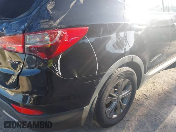 2014 Hyundai Santa Fe with VIN 5XYZU3LB3EG137347, listed as a IAAI auction lot 43476896 with 177,018 mi miles and . Bid and sale history available at DreamBid. Image 13.