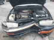 1993 Toyota Camry LE z VIN 4T1SK12E2PU176189, wystawiony jako IAAI lot #42711266 z przebiegiem 141 263 mil mil oraz . Historia ofert i sprzedaży dostępna na DreamBid. Obrazek 6.