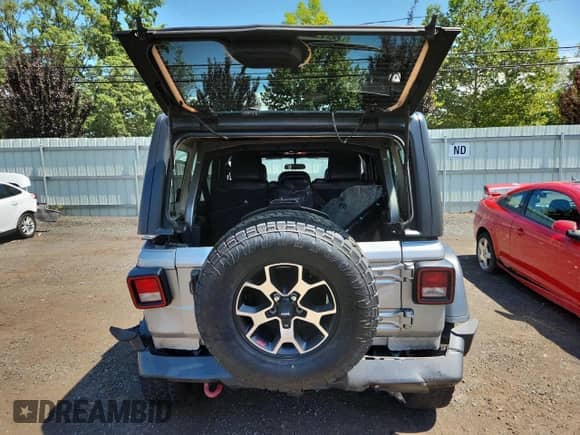 2021 Jeep Wrangler Unlimited Rubicon with VIN 1C4HJXFG0MW580804, listed as a Copart auction lot 69112745 with 66,158 mi miles and Salvage title. Bid and sale history available at DreamBid. Image 6.