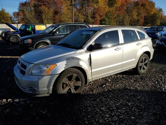 2012 Dodge Caliber SXT z VIN 1C3CDWDA4CD535180, wystawiony jako Copart lot #87394665 z przebiegiem 62 386 mil mil oraz Szkoda całkowita • Salvage title. Historia ofert i sprzedaży dostępna na DreamBid. Obrazek 1.