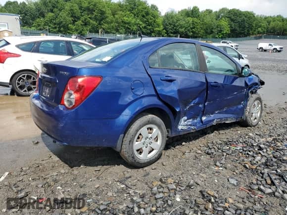 2014 Chevrolet Sonic LS z VIN 1G1JA5SGXE4197020, wystawiony jako Copart lot #61730585 z przebiegiem Nie podano mil oraz Szkoda całkowita • Salvage title. Historia ofert i sprzedaży dostępna na DreamBid. Obrazek 3.