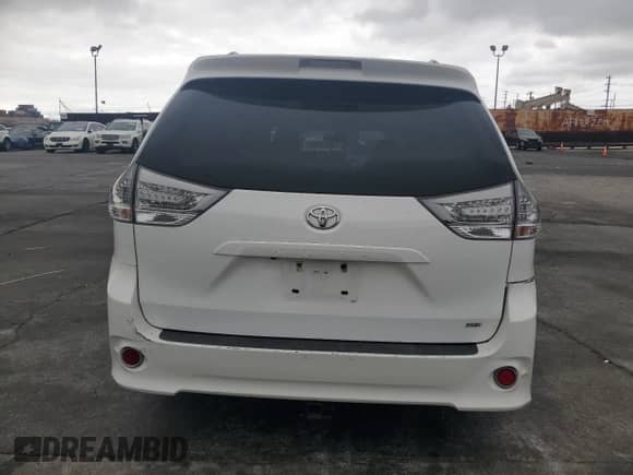 2015 Toyota Sienna SE with VIN 5TDXK3DC4FS663754, listed as a Copart auction lot 65745835 with 100,446 mi miles and Salvage title. Bid and sale history available at DreamBid. Image 6.
