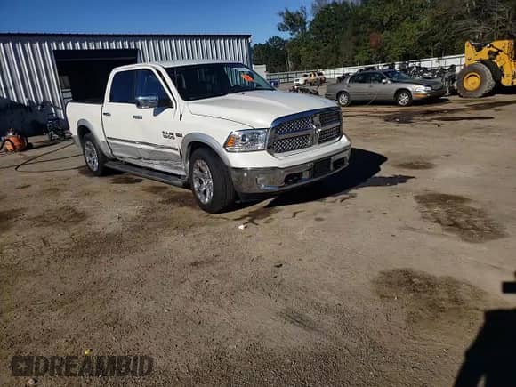 2018 Ram 1500 Laramie z VIN 1C6RR6NT1JS219193, wystawiony jako Copart lot #80721614 z przebiegiem Nie podano mil oraz Szkoda całkowita • Salvage title. Historia ofert i sprzedaży dostępna na DreamBid. Obrazek 13.