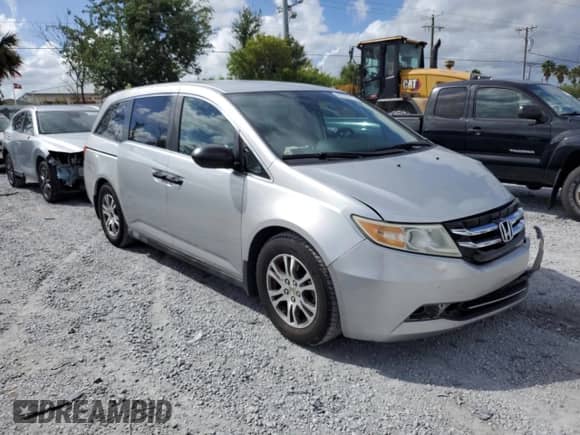 2015 Honda Odyssey LX with VIN 5FNRL5H22FB025431, listed as a Copart auction lot 82373215 with 112,487 mi miles and Salvage title. Bid and sale history available at DreamBid. Image 4.