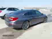 2021 Honda Accord EX-L z VIN 1HGCV1F53MA007226, wystawiony jako IAAI lot #43339713 z przebiegiem 73 947 mil mil oraz . Historia ofert i sprzedaży dostępna na DreamBid. Obrazek 4.