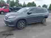 2020 Honda Pilot Touring 7-Passenger z VIN 5FNYF5H61LB011831, wystawiony jako IAAI lot #42681354 z przebiegiem 62 278 mil mil oraz . Historia ofert i sprzedaży dostępna na DreamBid. Obrazek 23.