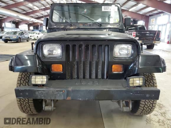 1993 Jeep Wrangler S с VIN 1J4FY19P9PP227563, выставлен на аукционе Copart как лот 60095405 с пробегом 166 851 миль миль и Чистый • Clean title. История ставок и продаж доступна на DreamBid. Изображение 5.