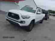 2018 Toyota Tacoma SR5 z VIN 3TMBZ5DN4JM014788, wystawiony jako IAAI lot #41252667 z przebiegiem 113 530 mil mil oraz . Historia ofert i sprzedaży dostępna na DreamBid. Obrazek 17.
