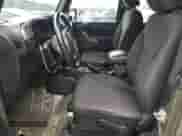 2015 Jeep Wrangler Willys Wheeler z VIN 1C4AJWAG7FL745593, wystawiony jako Copart lot #83771385 z przebiegiem 114 326 mil mil oraz Szkoda całkowita • Salvage title. Historia ofert i sprzedaży dostępna na DreamBid. Obrazek 7.