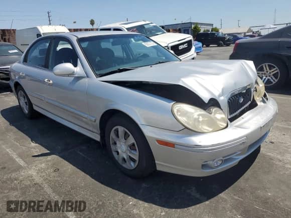 2004 Hyundai Sonata with VIN KMHWF25H54A928224, listed as a Copart auction lot 68222125 with 161,626 mi miles and Salvage title. Bid and sale history available at DreamBid. Image 4.