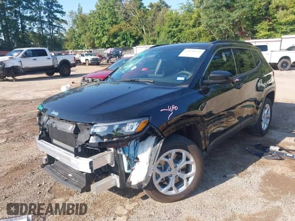 2024 Jeep Compass Latitude with VIN 3C4NJDBN7RT146382, listed as a IAAI auction lot 43130328 with 5,596 mi miles and . Bid and sale history available at DreamBid. Image 2.