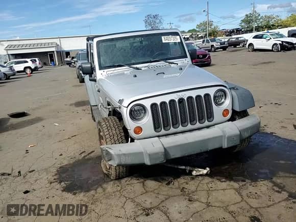 2007 Jeep Wrangler X с VIN 1J4FA24117L217338, выставлен на аукционе Copart как лот 84037325 с пробегом 113 001 миль миль и Списание • Salvage title. История ставок и продаж доступна на DreamBid. Изображение 13.