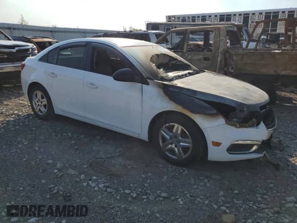 2015 Chevrolet Cruze LS с VIN 1G1PA5SH5F7171587, выставлен на аукционе Copart как лот 69455725 с пробегом Не указан миль и Списание • Salvage title. История ставок и продаж доступна на DreamBid. Изображение 4.