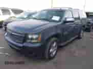 2011 Chevrolet Suburban LT with VIN 1GNSCJE00BR203099, listed as a IAAI auction lot 43037408 with 238,741 mi miles and . Bid and sale history available at DreamBid. Image 2.
