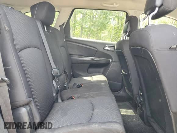 2013 Dodge Journey SXT с VIN 3C4PDCCG0DT650047, выставлен на аукционе Copart как лот 67013775 с пробегом 203 067 миль миль и Списание • Salvage title. История ставок и продаж доступна на DreamBid. Изображение 11.