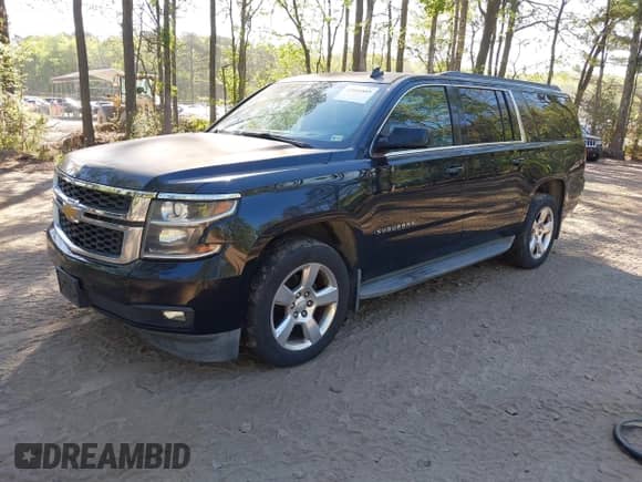 2015 Chevrolet Suburban LT with VIN 1GNSKJKC0FR238524, listed as a IAAI auction lot 42046889 with 179,676 mi miles and . Bid and sale history available at DreamBid. Image 18.