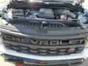 2024 Chevrolet Silverado 1500 Custom Trail Boss z VIN 3GCUDCE87RG454311, wystawiony jako Copart lot #66486955 z przebiegiem 3 402 mil mil oraz Szkoda całkowita • Salvage title. Historia ofert i sprzedaży dostępna na DreamBid. Obrazek 11.