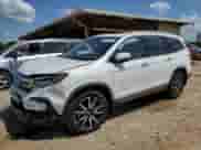 2020 Honda Pilot Touring 8-Passenger z VIN 5FNYF5H94LB011994, wystawiony jako Copart lot #56168045 z przebiegiem 91 737 mil mil oraz Szkoda całkowita • Salvage title. Historia ofert i sprzedaży dostępna na DreamBid. Obrazek 1.