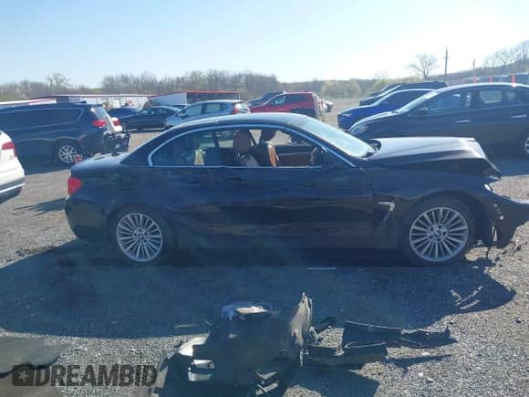 2014 BMW 4 Series 428i with VIN WBA3V7C59EJ872576, listed as a IAAI auction lot 41997699 with Not provided miles and . Bid and sale history available at DreamBid. Image 14.