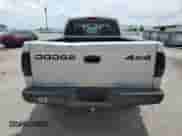 2002 Dodge Dakota z VIN 1B7GG12X92S697122, wystawiony jako Copart lot #56000975 z przebiegiem 151 012 mil mil oraz Szkoda całkowita • Salvage title. Historia ofert i sprzedaży dostępna na DreamBid. Obrazek 6.