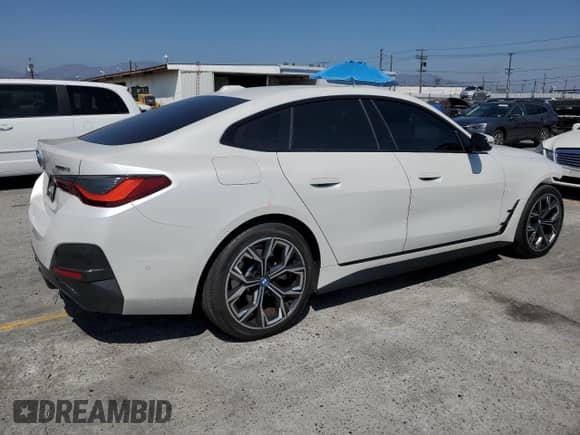 2022 BMW i4 eDrive40 with VIN WBY73AW08NFM75787, listed as a Copart auction lot 60339655 with 36,231 mi miles and Salvage title. Bid and sale history available at DreamBid. Image 3.