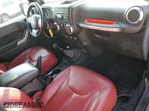 2013 Jeep Wrangler Rubicon 10th Anniversary with VIN 1C4BJWCG7DL651647, listed as a Copart auction lot 66891325 with 178,266 mi miles and Salvage title. Bid and sale history available at DreamBid. Image 8.