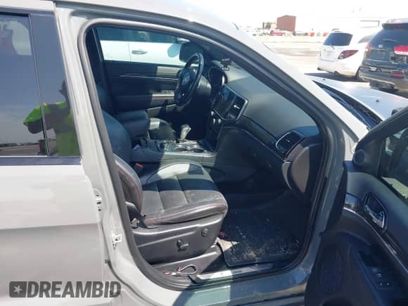 2020 Jeep Grand Cherokee Trailhawk with VIN 1C4RJFLT7LC357935, listed as a IAAI auction lot 40031620 with 70,836 mi miles and . Bid and sale history available at DreamBid. Image 5.