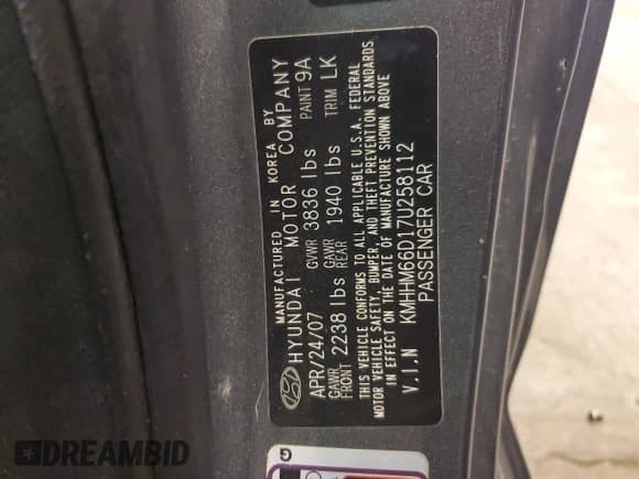 2007 Hyundai Tiburon GS with VIN KMHHM66D17U258112, listed as a Copart auction lot 60286334 with 117,735 mi miles and Salvage title. Bid and sale history available at DreamBid. Image 12.