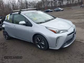2022 Toyota Prius L Eco with VIN JTDKAMFU7N3154962, listed as a IAAI auction lot 40714455 with 53,588 mi miles and . Bid and sale history available at DreamBid. Image 1.