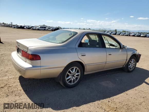 2001 Toyota Camry LE z VIN JT2BF28K010302598, wystawiony jako Copart lot #80579165 z przebiegiem 155 338 mil mil oraz Szkoda całkowita • Salvage title. Historia ofert i sprzedaży dostępna na DreamBid. Obrazek 3.
