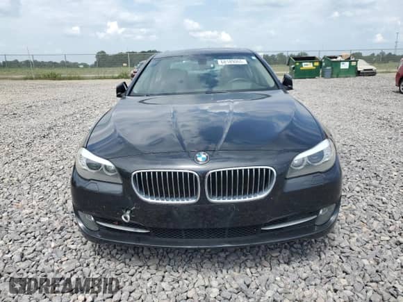 2013 BMW 5 Series 535i xDrive with VIN WBAFU7C5XDDU67159, listed as a Copart auction lot 68189065 with 161,702 mi miles and Salvage title. Bid and sale history available at DreamBid. Image 5.