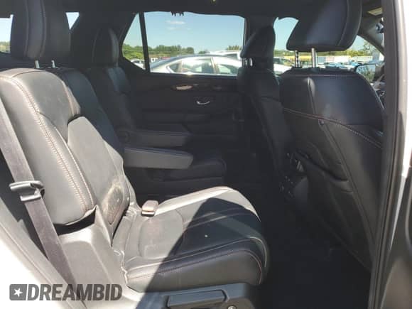 2023 Honda Pilot TrailSport with VIN 5FNYG1H68PB048872, listed as a Copart auction lot 71953785 with 24,062 mi miles and Salvage title. Bid and sale history available at DreamBid. Image 11.