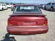 1996 Saturn SL with VIN 1G8ZK5278TZ334649, listed as a Copart auction lot 54098725 with 156,012 mi miles and Salvage title. Bid and sale history available at DreamBid. Image 6.