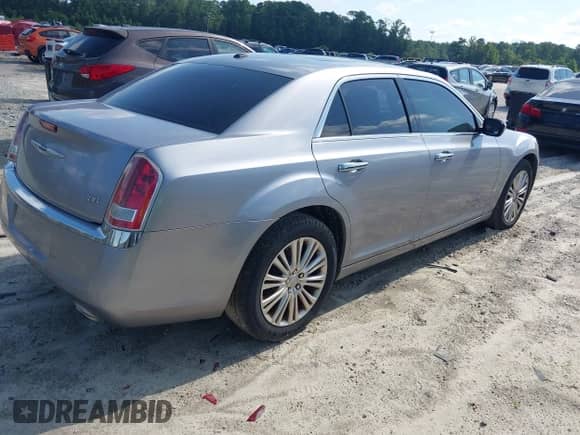 2013 Chrysler 300 with VIN 2C3CCARG0DH605717, listed as a IAAI auction lot 42693394 with 6,213 mi miles and . Bid and sale history available at DreamBid. Image 4.