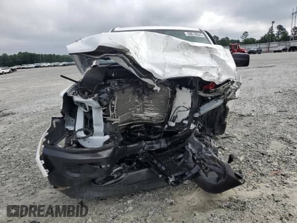 2024 Ram 1500 Tradesman with VIN 1C6RREGG7RN210034, listed as a Copart auction lot 59610625 with 14,443 mi miles and Salvage title. Bid and sale history available at DreamBid. Image 5.