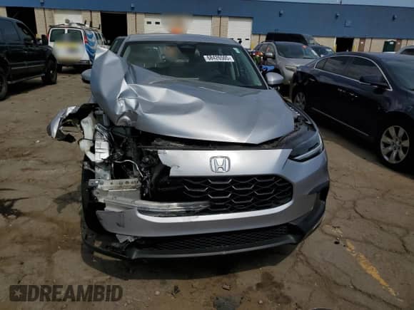 2023 Honda HR-V LX z VIN 3CZRZ2H34PM733581, wystawiony jako Copart lot #68426505 z przebiegiem Nie podano mil oraz Czysty tytuł • Clean title. Historia ofert i sprzedaży dostępna na DreamBid. Obrazek 5.
