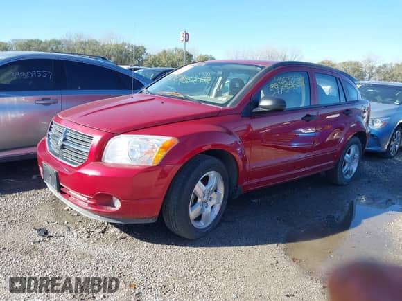 2007 Dodge Caliber SXT with VIN 1B3HB48B67D248946, listed as a IAAI auction lot 40877529 with 45,569 mi miles and . Bid and sale history available at DreamBid. Image 2.