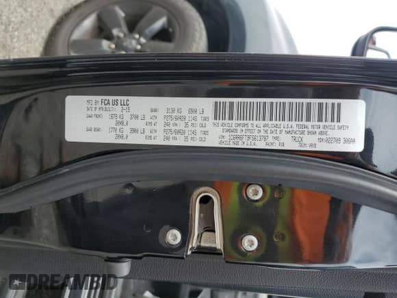 2015 Ram 1500 Express with VIN 1C6RR6FT9FS613787, listed as a Copart auction lot 70908665 with 179,693 mi miles and Salvage title. Bid and sale history available at DreamBid. Image 12.