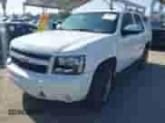 2007 Chevrolet Tahoe LTZ с VIN 1GNFC130X7R105323, выставлен на аукционе IAAI как лот 42533832 с пробегом 230 946 миль миль и . История ставок и продаж доступна на DreamBid. Изображение 2.