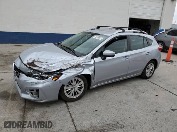 2018 Subaru Impreza Premium with VIN 4S3GTAB66J3750158, listed as a Copart auction lot 70566835 with Not provided miles and Salvage title. Bid and sale history available at DreamBid. Image 1.
