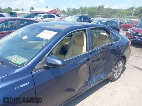 2015 Toyota Camry LE with VIN 4T1BD1FK8FU165173, listed as a IAAI auction lot 42662431 with 297,983 mi miles and . Bid and sale history available at DreamBid. Image 6.