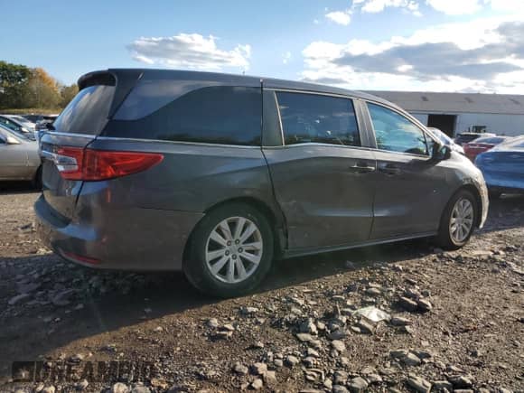 2020 Honda Odyssey LX with VIN 5FNRL6H20LB047462, listed as a Copart auction lot 82296145 with 61,618 mi miles and Salvage title. Bid and sale history available at DreamBid. Image 3.