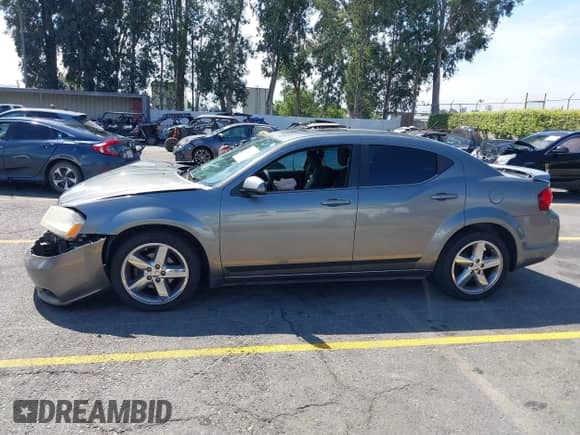 2012 Dodge Avenger SXT Plus with VIN 1C3CDZEG6CN325811, listed as a IAAI auction lot 43247091 with 200,293 mi miles and . Bid and sale history available at DreamBid. Image 14.