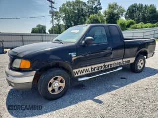 2004 Ford F-150 XL with VIN 2FTRX18W04CA13170, listed as a Copart auction lot 60932775 with 233,249 mi miles and Salvage title. Bid and sale history available at DreamBid. Image 1.