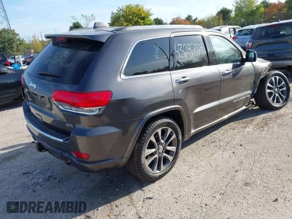 2017 Jeep Grand Cherokee Overland with VIN 1C4RJFCG4HC729662, listed as a IAAI auction lot 43282727 with 138,876 mi miles and . Bid and sale history available at DreamBid. Image 4.