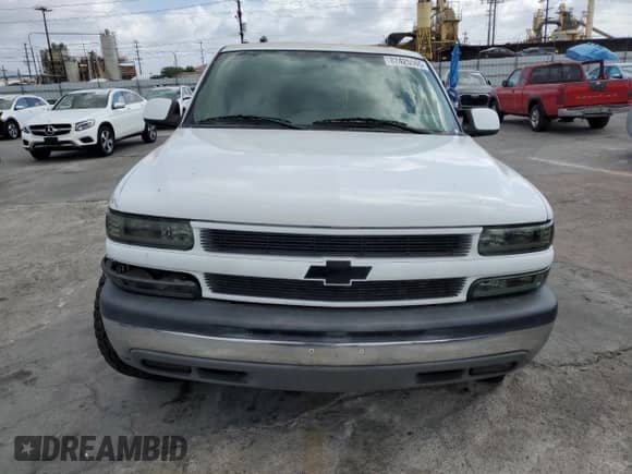 2004 Chevrolet Tahoe LS z VIN 1GNEC13V34R257463, wystawiony jako Copart lot #82425565 z przebiegiem 134 554 mil mil oraz Szkoda całkowita • Salvage title. Historia ofert i sprzedaży dostępna na DreamBid. Obrazek 5.