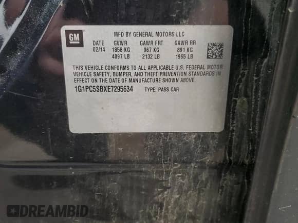 2014 Chevrolet Cruze 1LT z VIN 1G1PC5SBXE7295634, wystawiony jako Copart lot #82329965 z przebiegiem 139 795 mil mil oraz Szkoda całkowita • Salvage title. Historia ofert i sprzedaży dostępna na DreamBid. Obrazek 12.