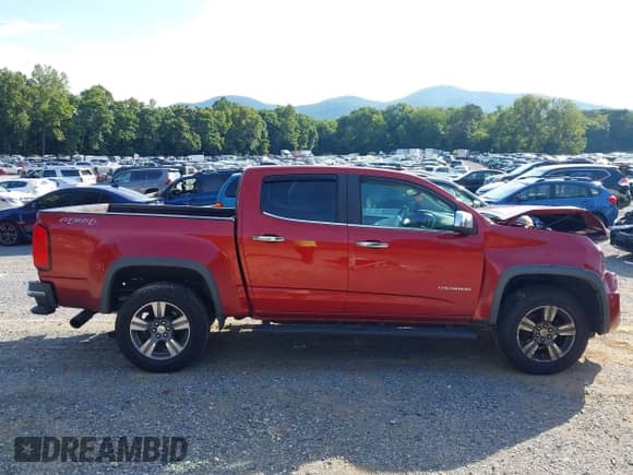 2015 Chevrolet Colorado 4WD LT z VIN 1GCGTBE31F1184744, wystawiony jako IAAI lot #42988122 z przebiegiem 122 987 mil mil oraz . Historia ofert i sprzedaży dostępna na DreamBid. Obrazek 14.
